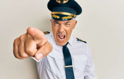 An image of a very angry airline pilot.