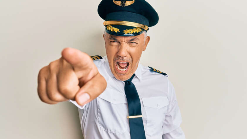 An image of a very angry airline pilot.