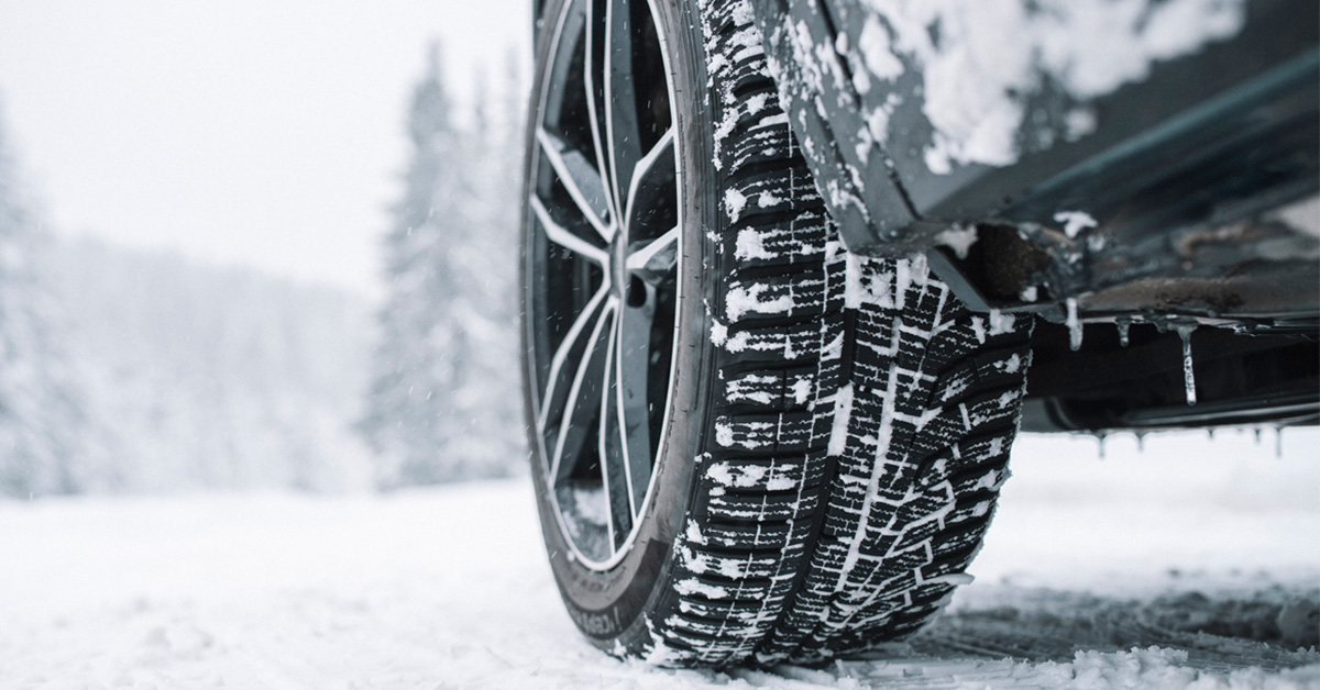 An image of a car that has been fitted with snow tires.