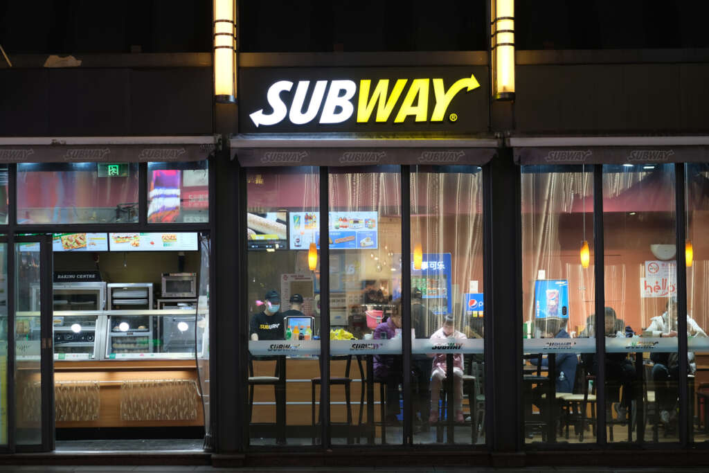 The outside of a Subway restaurant. 