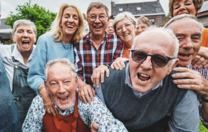 A group of joyful boomers have a great time.