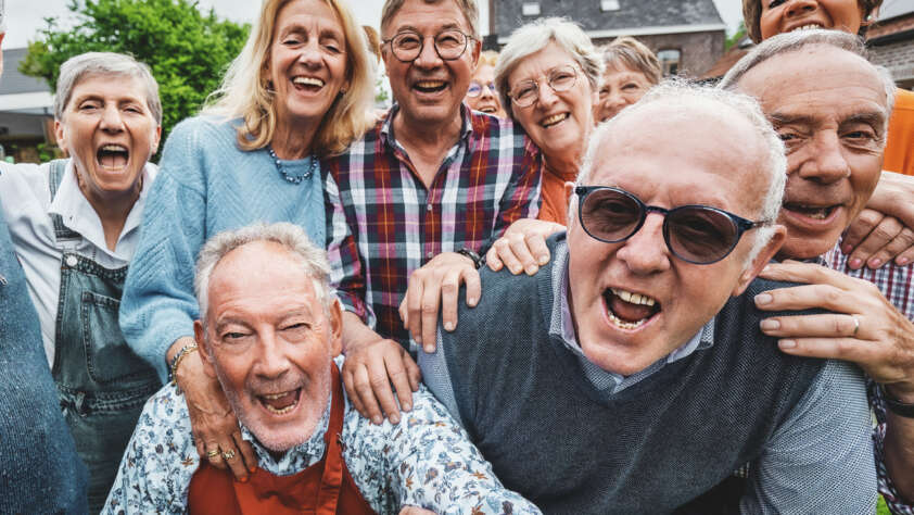 A group of joyful boomers have a great time.