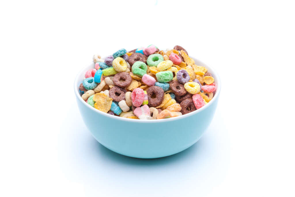 A close-up image of a bowl of sugary cereal. 