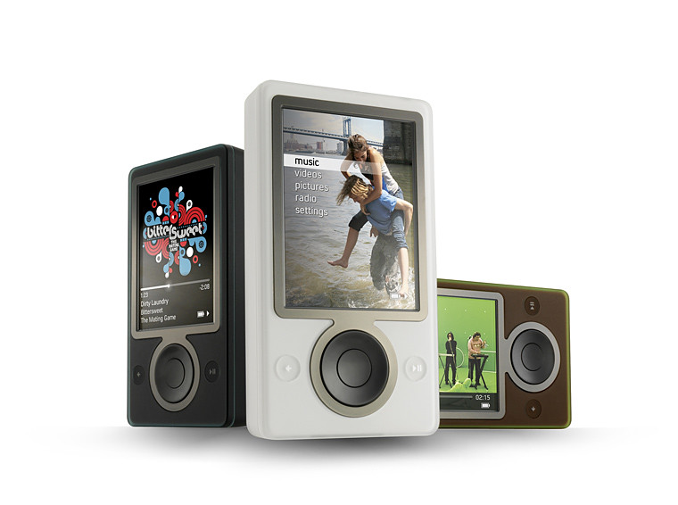 An image of a few different Zune 1's next to each other. 