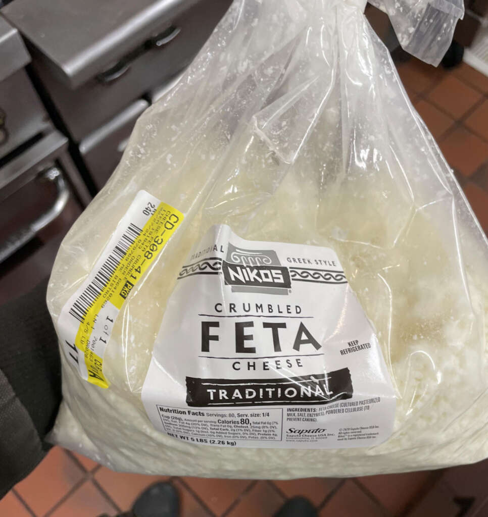 An image of a huge bag of Feta cheese. 