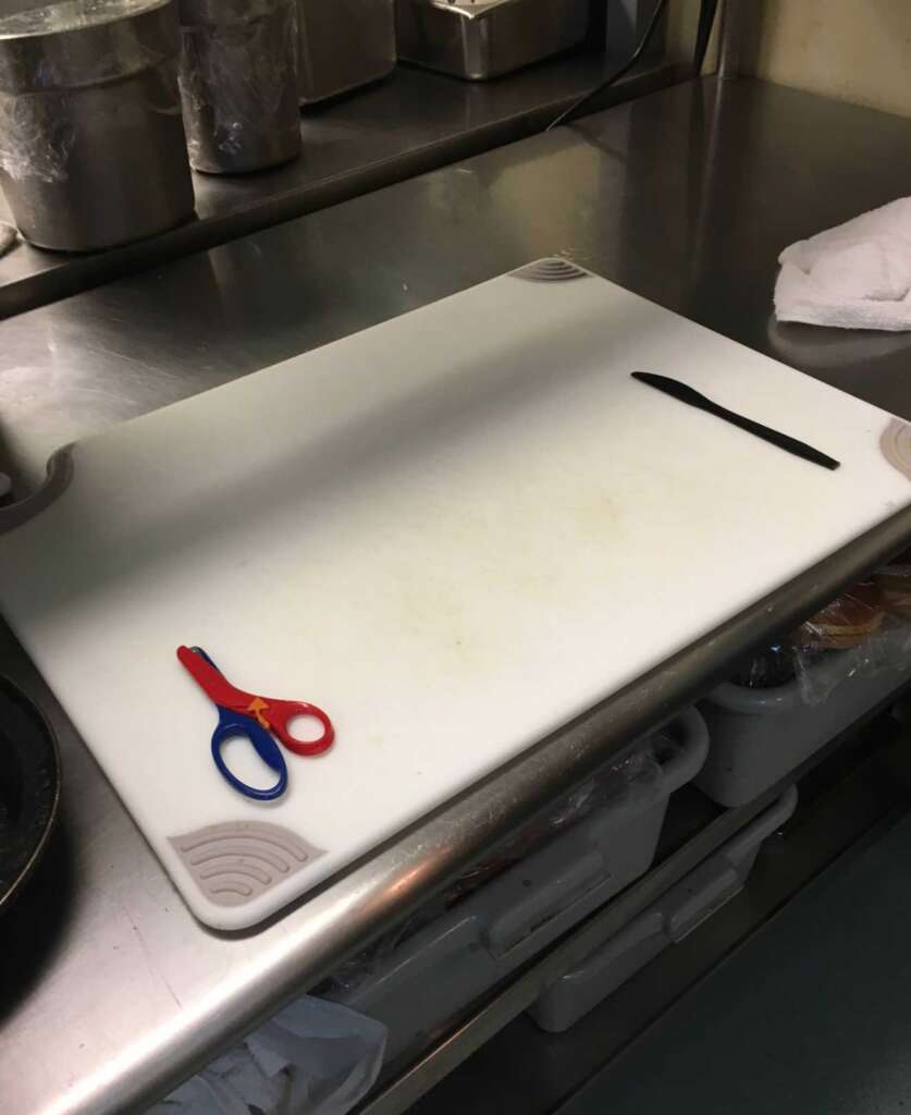 Chefs station with safety scissors and a plastic knife