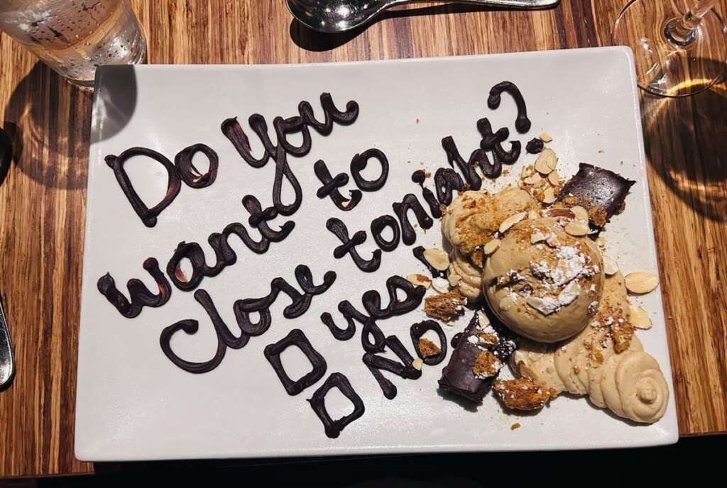 An image of a dessert that was plated to show a message to an employee who dined at the restaurant on their night off. 