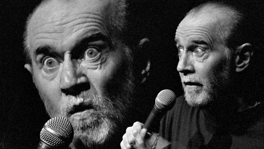 Black and white image of an older man with a beard, holding a microphone, featuring two different expressions. One shows him wide-eyed and animated, while the other is contemplative, looking to the side.