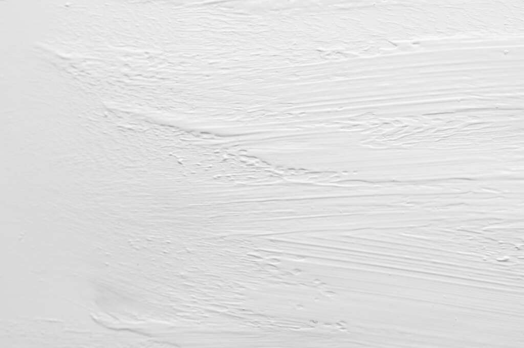 An image of a white painted background. 
