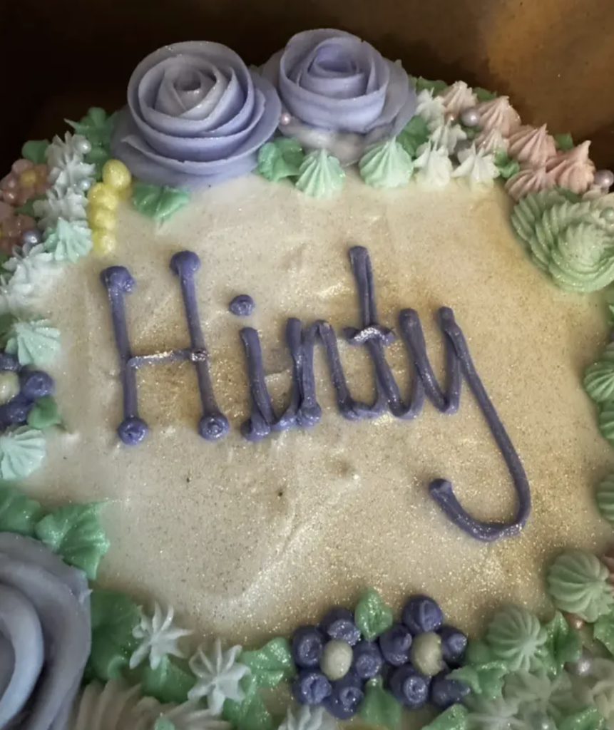 An image of a husband's wife's birthday cake that got messed up. 