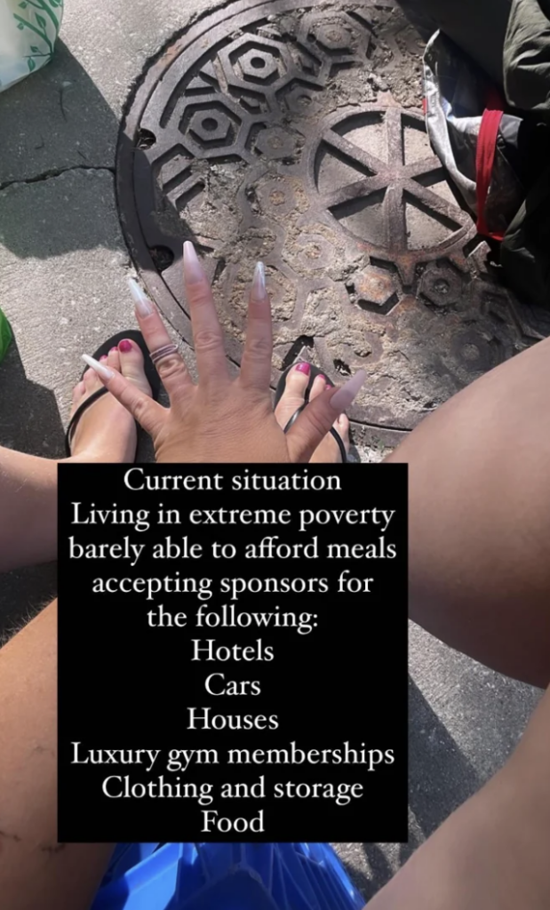 A person's hand with long nails is placed over their leg in an outdoor setting. A text overlay reads: "Current situation: Living in extreme poverty barely able to afford meals accepting sponsors for the following: Hotels, Cars, Houses, Luxury gym memberships, Clothing and storage, Food.