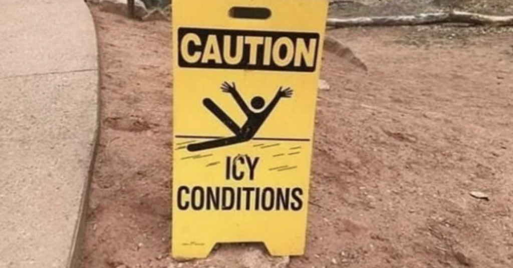 An image of a creepy looking icy conditions sign. 