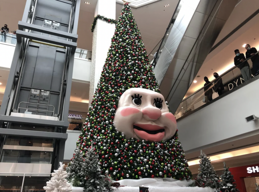 A very scary looking giant Christmas treen in a mall. 