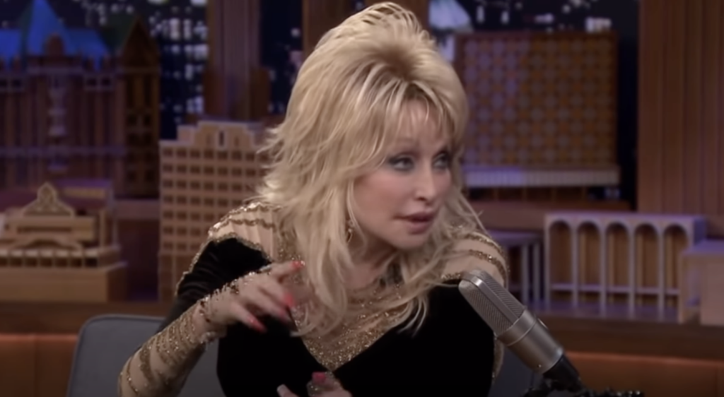 Dolly Parton being interviewed on a late night show. 
