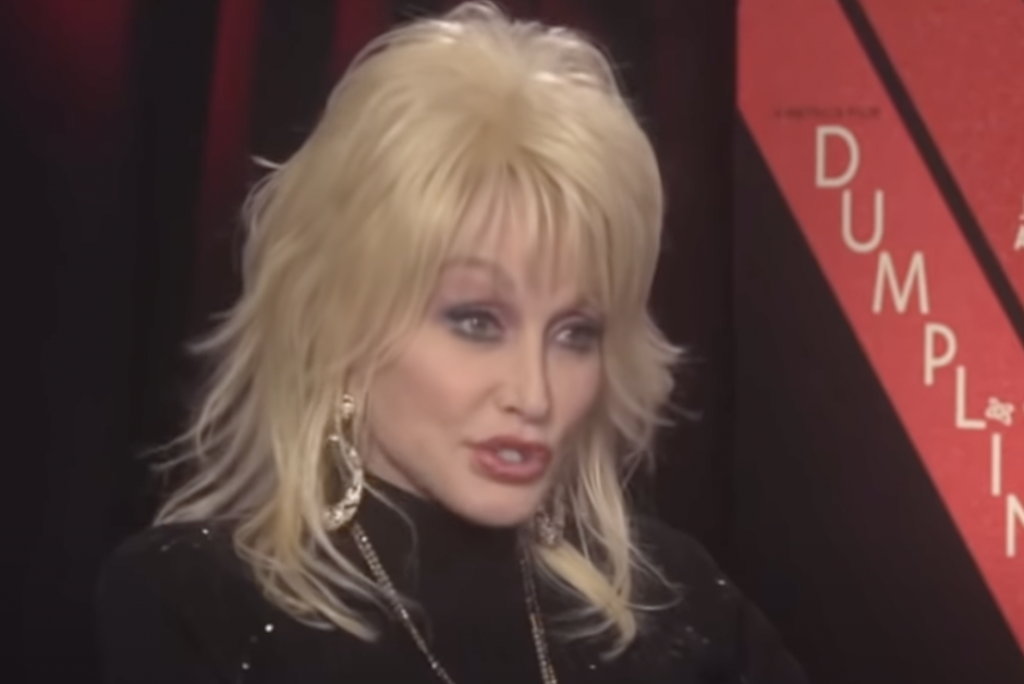 Dolly Parton being interviewed for "Dumpling" movie. 