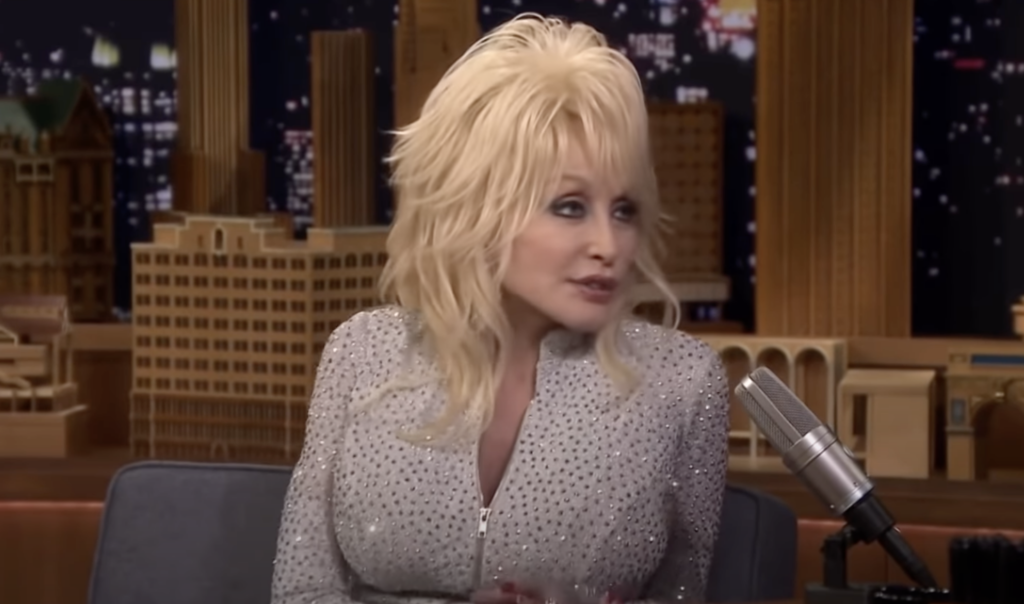 Dolly Parton being interviewed on a late night talk show. 