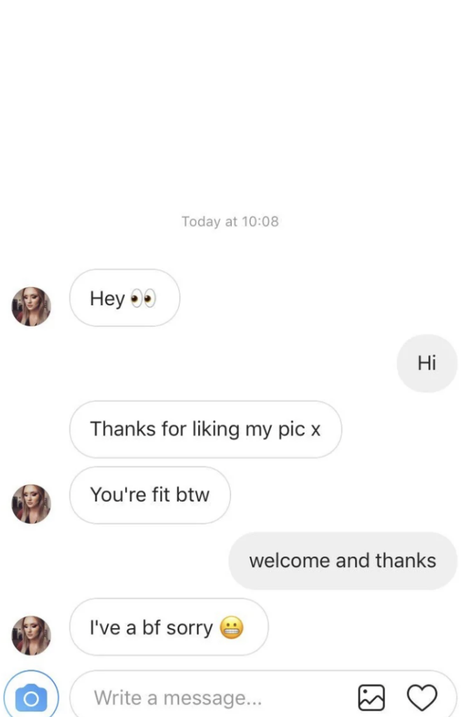 A screenshot of a direct message conversation on Instagram. The first person sends messages saying "Hey" with eye emojis, "Thanks for liking my pic x," "You're fit btw," and "I've a bf sorry" with a sad emoji. The second person replies with "Hi" and "welcome and thanks.