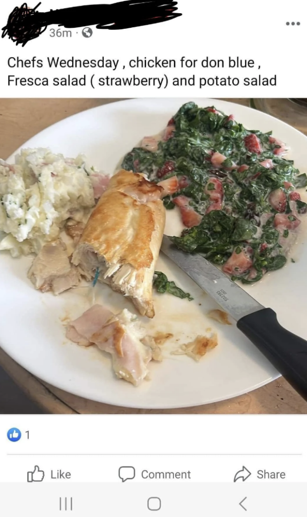 A Facebook post shows a plate of food that includes pieces of chicken, a green and red leaf salad, and a serving of potato salad. A knife is placed on the plate. The text in the post's description lists the items as chicken for don blue, Fresca salad (strawberry), and potato salad.