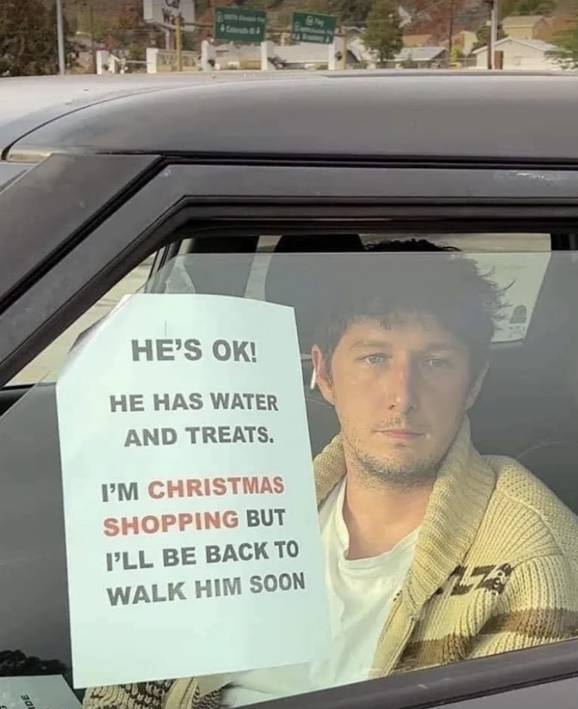 An image of a young boyfriend in a car with a note on the window. 