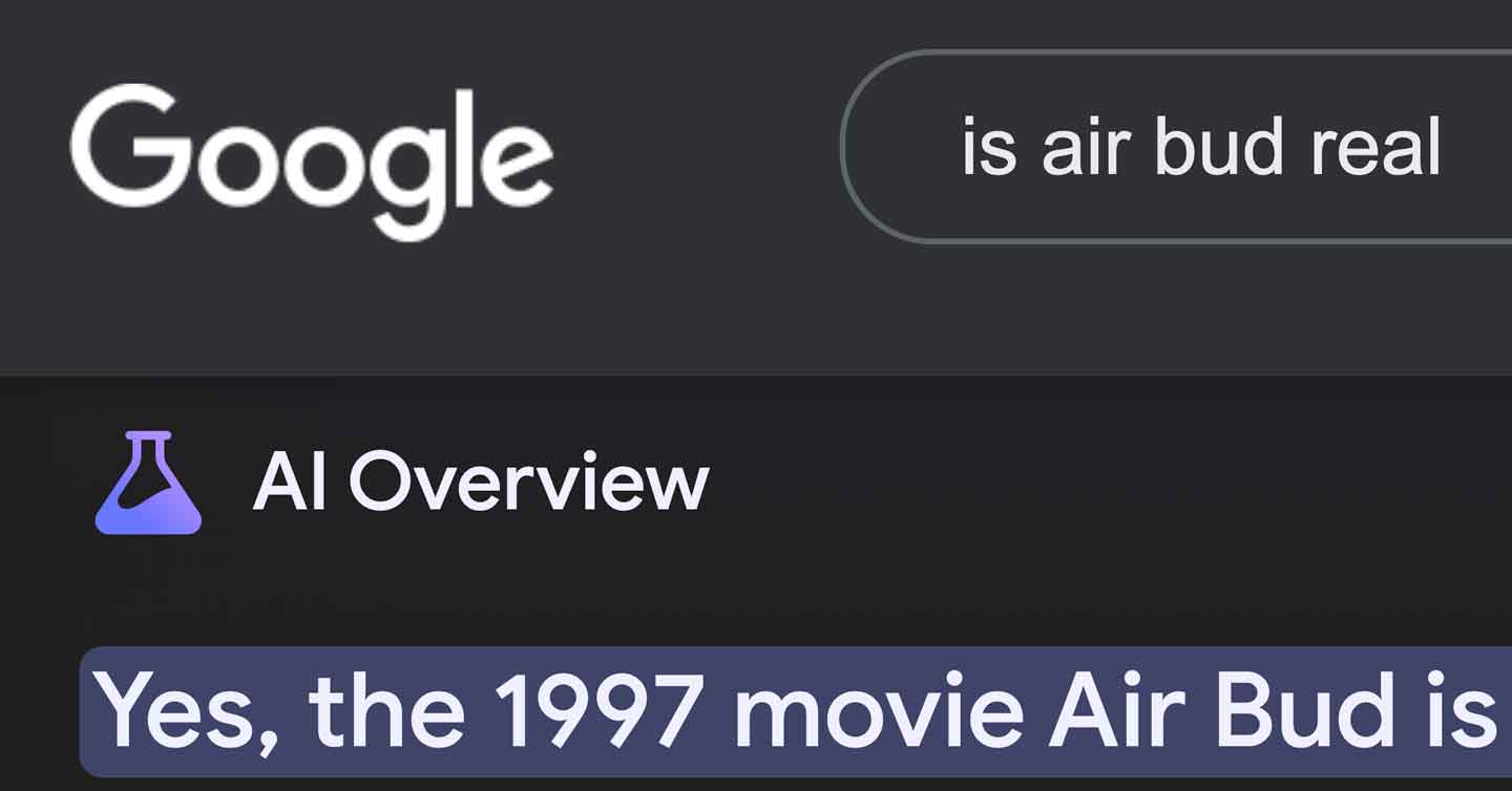 A Google search bar with the query "is air bud real" displays a response under "AI Overview" stating, "Yes, the 1997 movie Air Bud is.