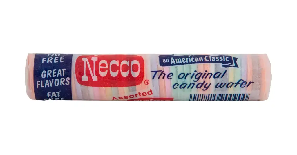A roll of Necco assorted candy wafers in colorful packaging. The label reads "Necco," "Great Flavors," "Fat Free," "An American Classic," and "The original candy wafer." The package features a barcode and multicolored candy disks visible through the wrapper.