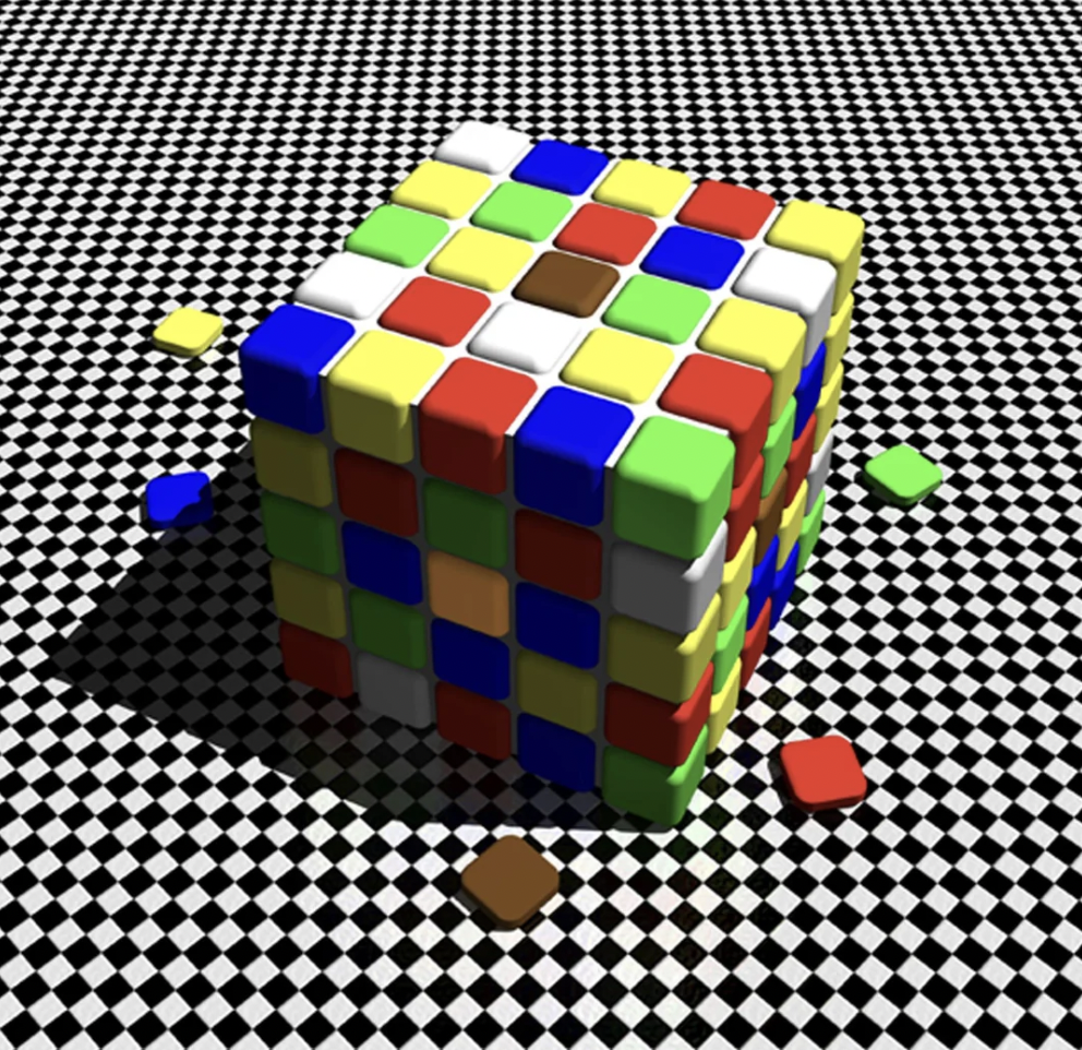 A colorful 4x4 Rubik's cube sits on a black and white checkerboard surface. The cube's pieces are scattered around, including green, yellow, red, blue, and brown tiles. The cube is missing some pieces, revealing the white inner structure.