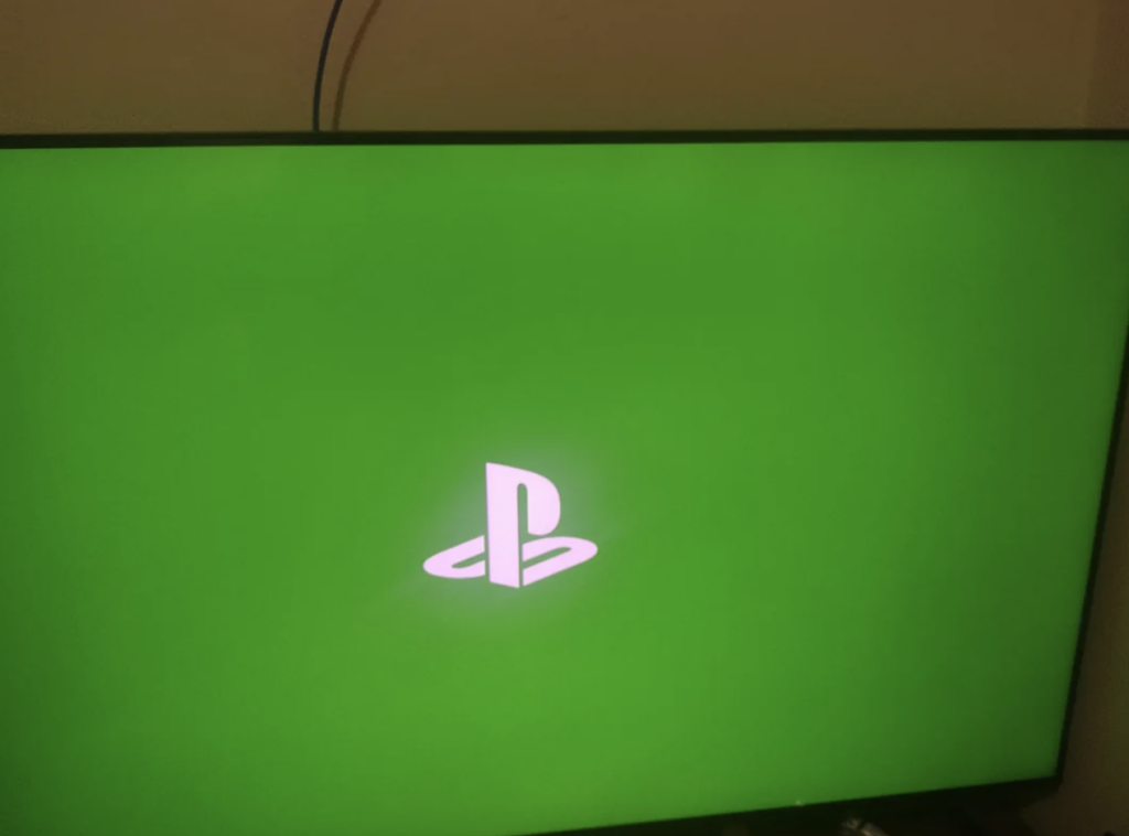 A green-colored PlayStation screen. 