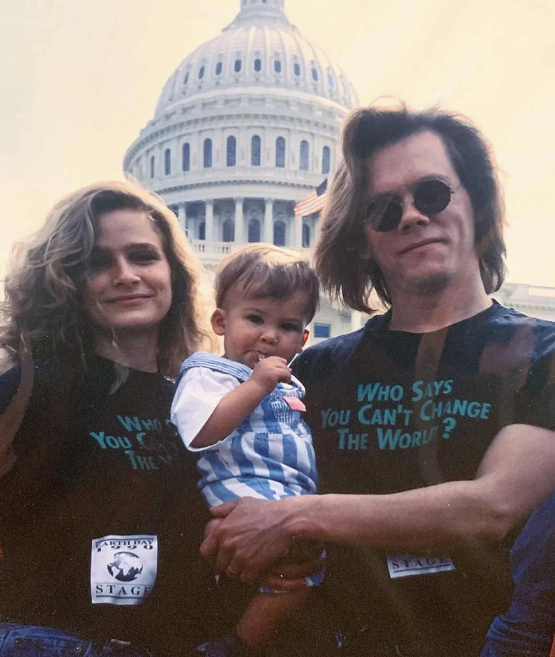 An image of Kevin Bacon next to his wife from back in the '90s. 