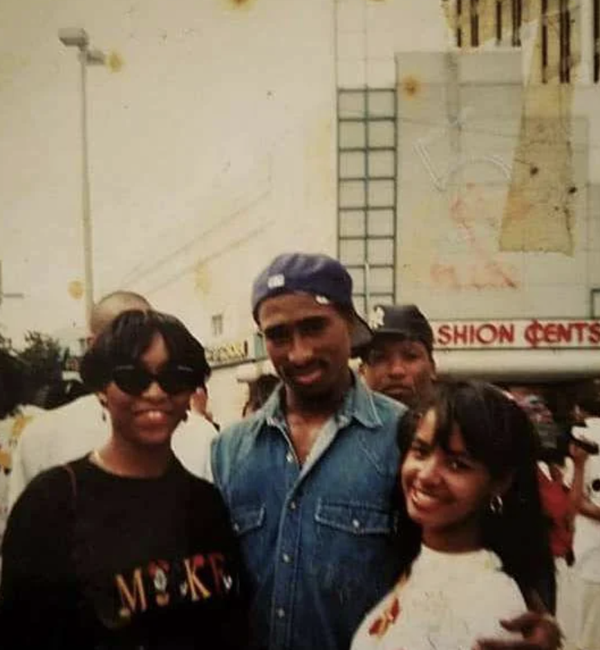 Someone who had their picture taken with Tupac Shakur. 