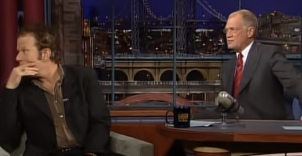 Tom Waits looking away from Letterman. 