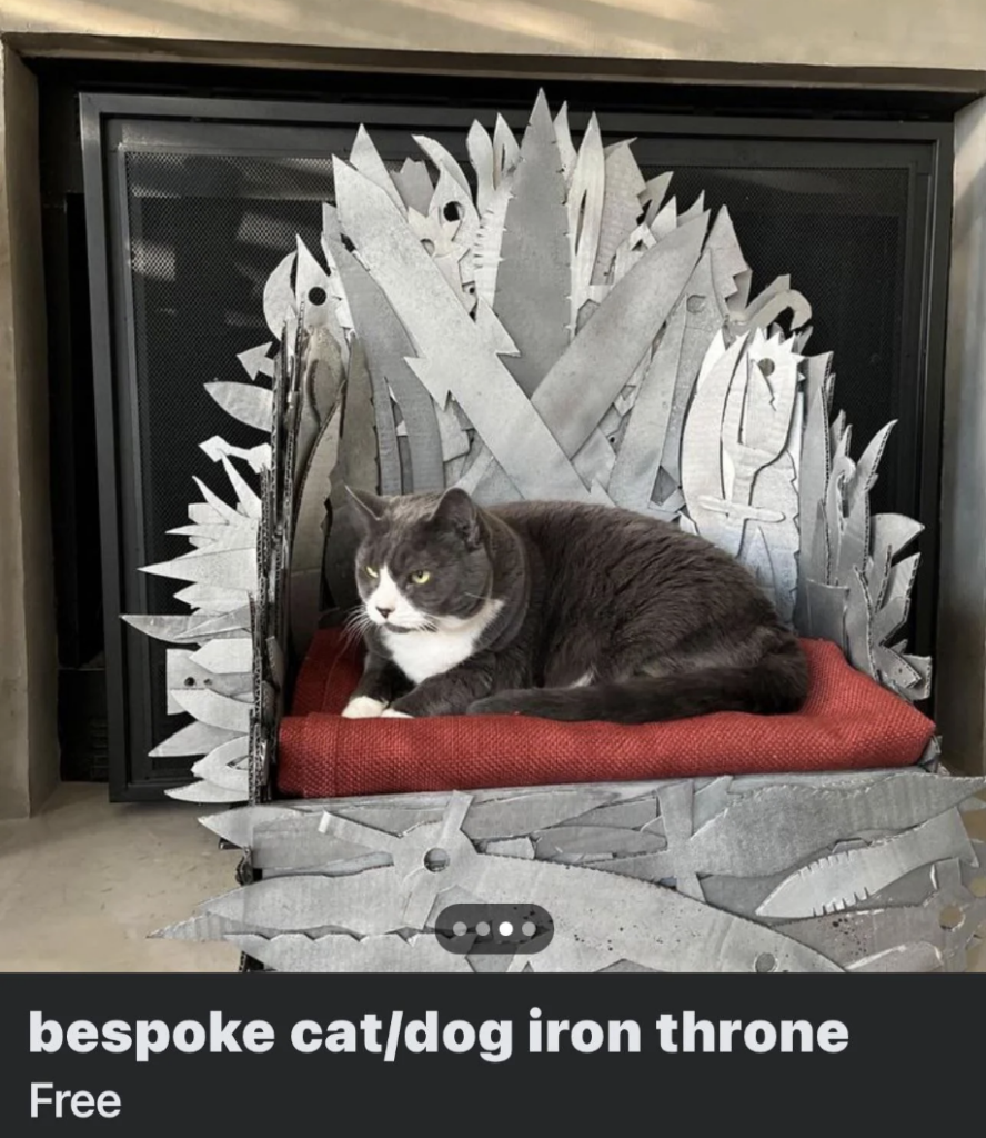 An image of a cat sitting on a throne cushion inspired by Game of Thrones. 