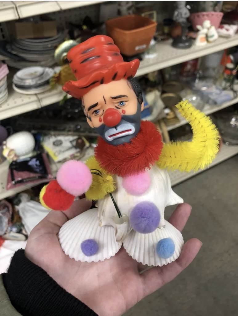 An image of a strange bearded clown collectible. 