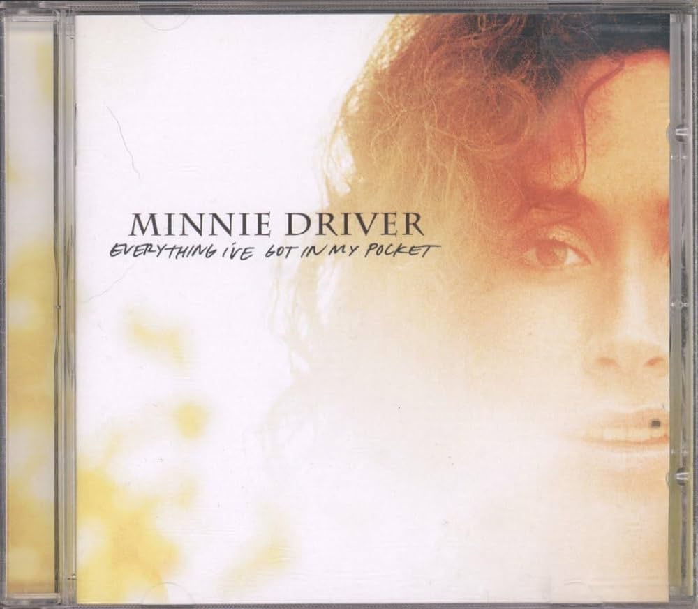 The cover of the album "Everything I’ve Got in My Pocket" by Minnie Driver features a close-up, partially visible image of the artist's face with a soft, light-toned background. The artist's name and album title are written in a simple, elegant font.
