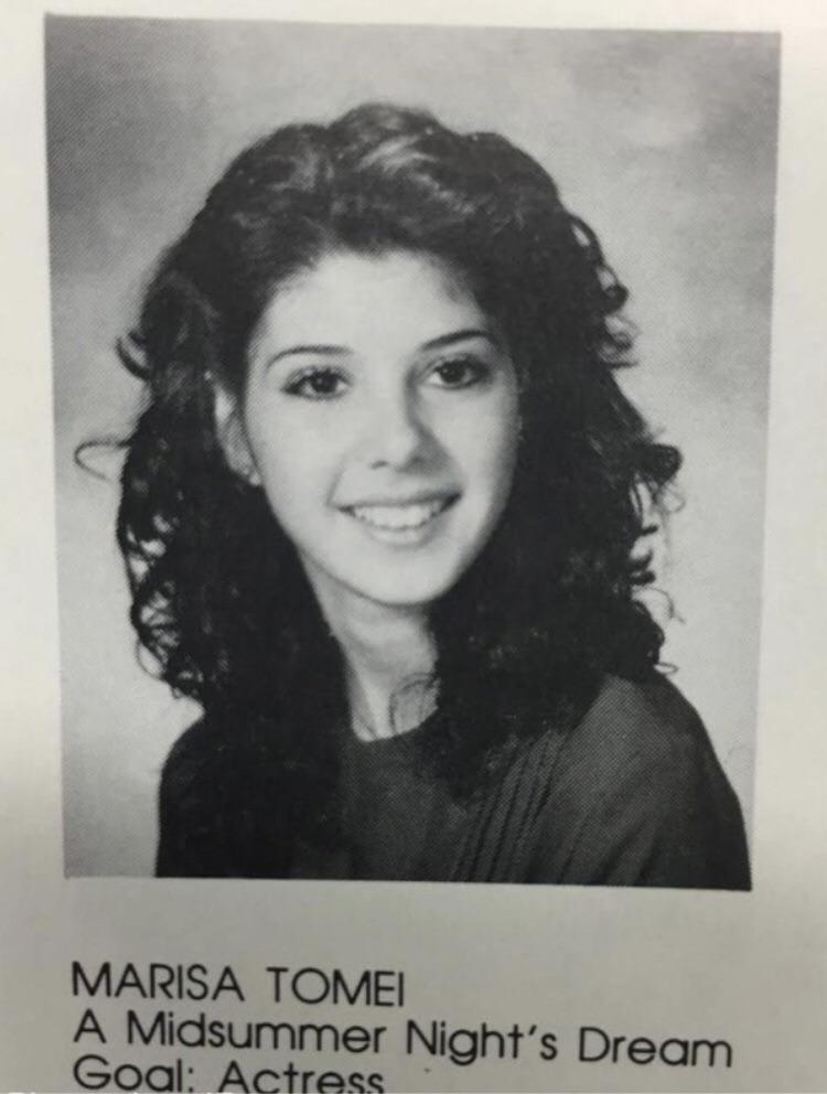 A black-and-white yearbook photo of a young woman with curly hair and a warm smile. Below the photo, text reads: "MARISA TOMEI A Midsummer Night's Dream Goal: Actress".