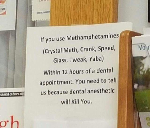 A sign on a wall warns that using methamphetamines within 12 hours of a dental appointment can be deadly when combined with dental anesthetic. The sign lists various street names for methamphetamines, such as Crystal Meth, Crank, Speed, Glass, Tweak, and Yaba.