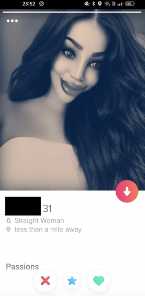 A grayscale profile picture of a woman with long dark hair and prominent makeup. The dating profile displays her age as 31, her sexual orientation as straight, and she is less than a mile away. There are icons for passion interests and interaction options at the bottom.