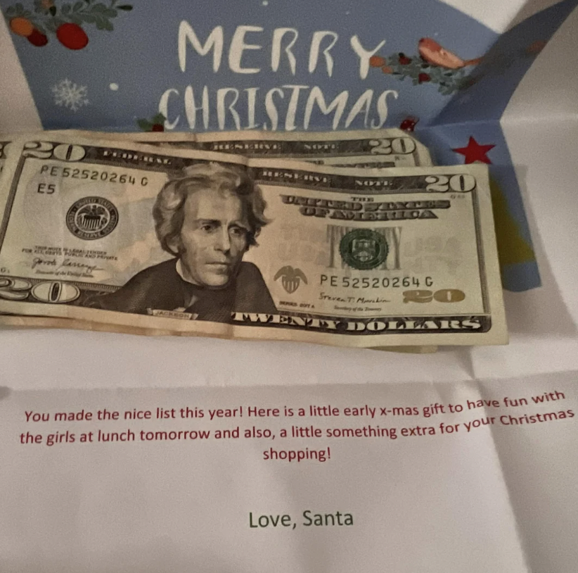 An open Christmas card with "Merry Christmas" written on it. Inside are two $20 bills and a note that reads, "You made the nice list this year! Here is a little early x-mas gift to have fun with the girls at lunch tomorrow and also, a little something extra for your Christmas shopping! Love, Santa