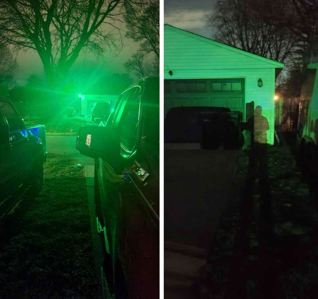 A split image shows two scenes at night, both illuminated by green light. The left side shows two parked vehicles and surrounding trees. The right side depicts a person standing in a driveway near a garage, casting a long shadow on the ground.