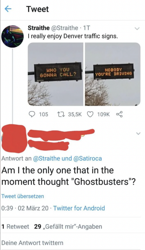 A tweet from Straithé with a picture of two Denver traffic signs. The left sign reads, "WHO YOU GONNA CALL?" and the right sign reads, "NOBODY YOU'RE DRIVING." Straithé writes, "I really enjoy Denver traffic signs." A user replies, "Am I the only one that in the moment thought 'Ghostbusters'?