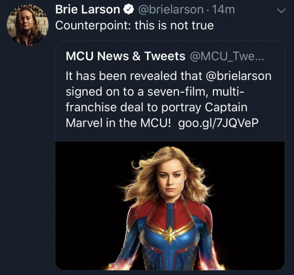 Screenshot of a tweet from Brie Larson stating, "Counterpoint: this is not true," in response to an earlier tweet from "MCU News & Tweets" that claims Brie Larson signed a seven-film, multi-franchise deal to portray Captain Marvel in the MCU. An image of Brie Larson as Captain Marvel is shown.