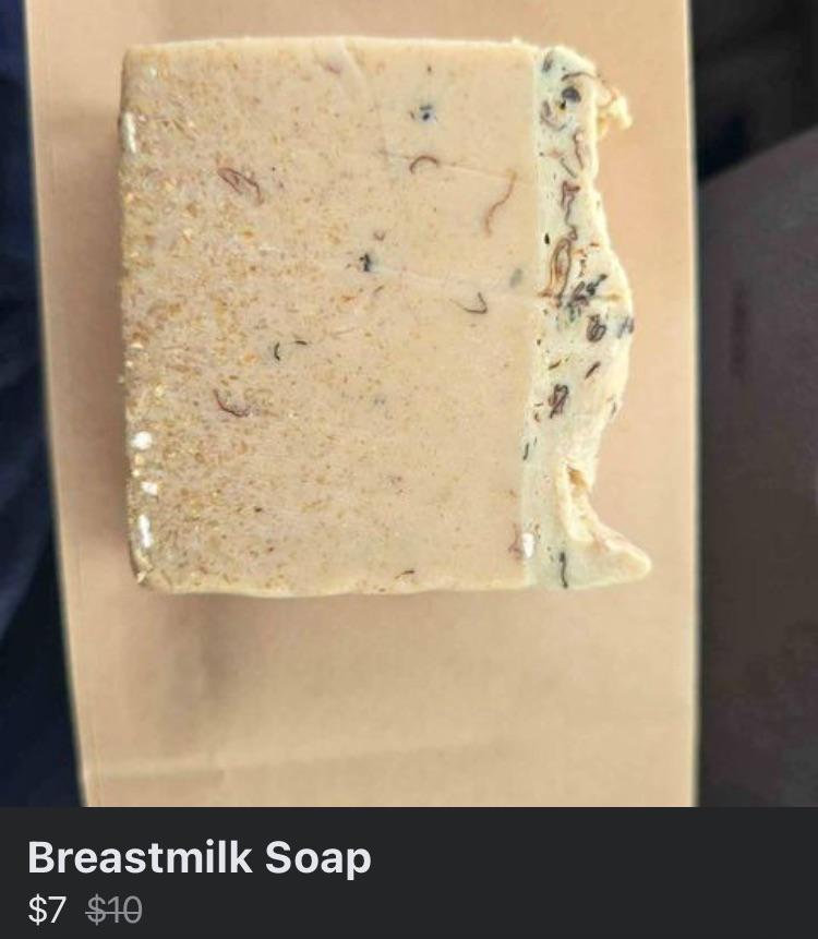 A rectangular bar of beige soap with a rough, textured surface, shown on a light brown background. Text at the bottom reads "Breastmilk Soap" priced at "$7" with the original price of "$10" crossed out.