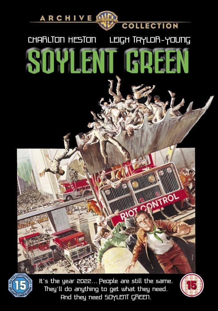 Poster for the movie "Soylent Green" from the Warner Bros. Archive Collection. Features a futuristic scene with a "Riot Control" truck scooping up people. Tagline reads, "It's the year 2022... People are still the same. They'll do anything to get what they need. And they need Soylent Green." Rated 15.