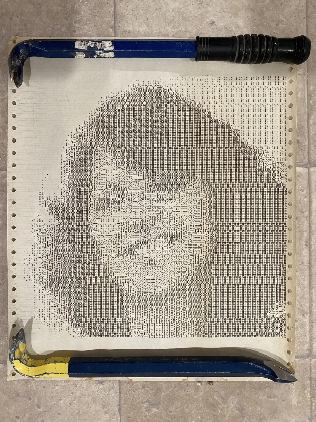 A pegboard with a rendered image of a smiling woman created using densely arranged pegs. There is a blue and yellow crowbar placed horizontally at the bottom, and a blue crowbar with a black handle placed horizontally at the top of the pegboard.