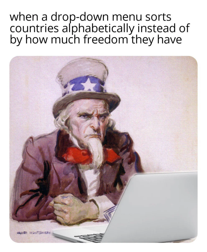 An illustration of a stern-looking Uncle Sam wearing his iconic red, white, and blue clothing, staring intently at a laptop screen. A caption above reads, "when a drop-down menu sorts countries alphabetically instead of by how much freedom they have.