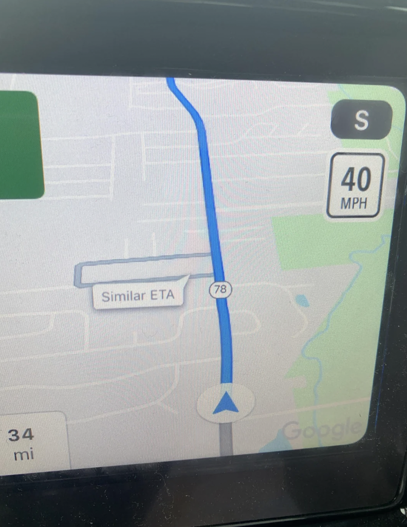 A GPS navigation display showing a route on highway 78 with a speed limit of 40 MPH. The screen indicates an upcoming turn with "Similar ETA" and shows the driver is 34 miles away from the next destination point. The background map includes roads and green areas.