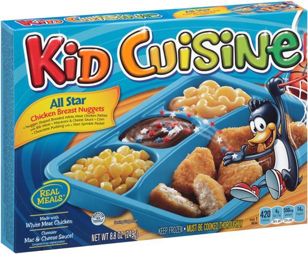 A box of Kid Cuisine All Star Chicken Breast Nuggets frozen meal. The cover features images of corn, chicken nuggets, and macaroni and cheese in a blue segmented tray. A penguin dressed as a basketball player is shown on the right, holding a nugget with a fork.