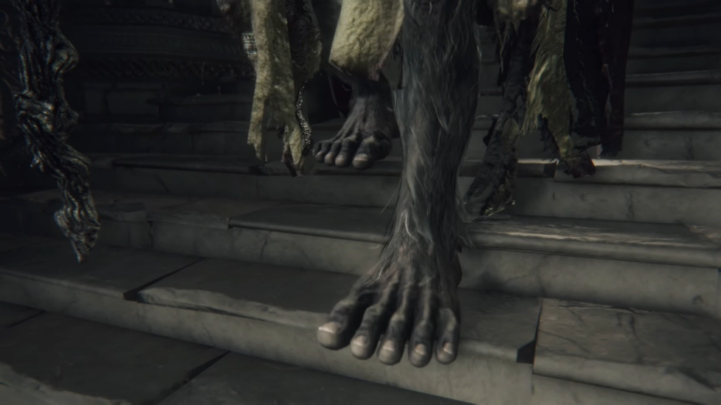 Close-up of large, clawed, and hairy feet of a werewolf-like creature walking down stone steps in a dimly lit environment. The creature's limbs appear muscular, covered in tattered clothing or remains of a garment reminiscent of those found in Elden Ring memes.