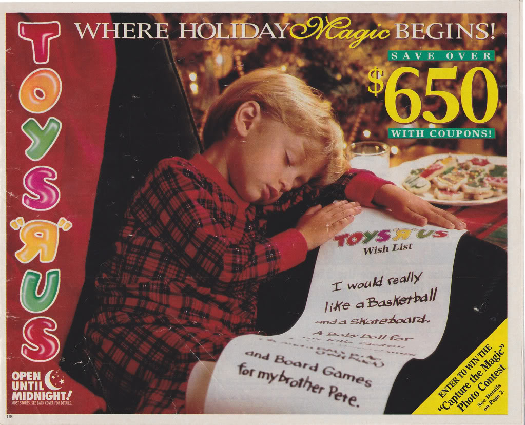 A young blonde child, wearing a red shirt, sleeps on a table with their head resting on a "TOYS 'R' US" Wish List. The list reads, "I would really like a Basketball and a Skateboard." The image is a holiday-themed ad with offers and text about savings.