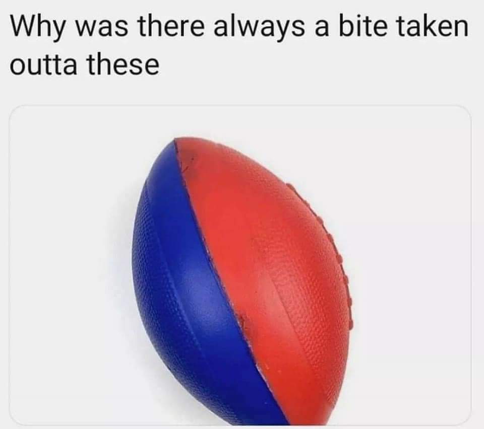A red and blue plastic football is shown with text above it reading, "Why was there always a bite taken outta these?". The football appears to have a semi-circular bite mark on the red side, suggesting past experiences where this repeatedly happened.