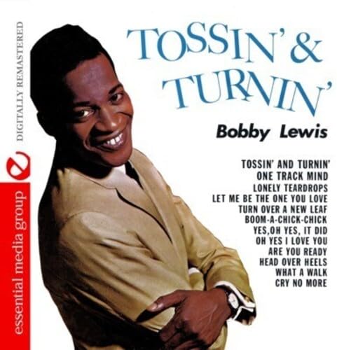 Album cover of "Tossin' & Turnin'" by Bobby Lewis. The cover features a photo of Bobby Lewis smiling and leaning back with arms crossed. The tracklist is on the right, and a red vertical banner on the left reads "essential media group". The album is digitally remastered.